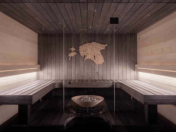 Indoor traditional wood sauna (illustrative)